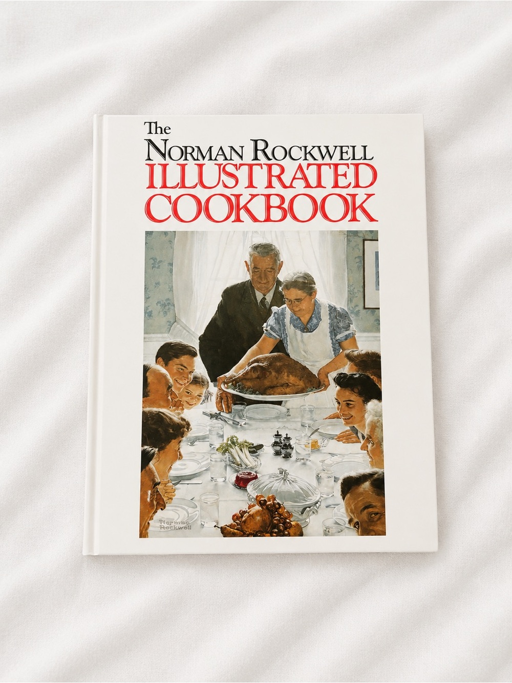 Norman Rockwell Cookbook with Red Typography and White Cover